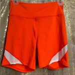 Free People Movement Space Race Orange Bike Shorts Medium NWOT Photo 0