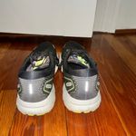 Brooks Black and Yellow Running Shoes Women’s Size 10 Photo 1