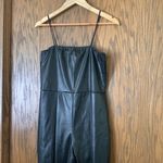 Pretty Little Thing  black strappy split hem flare jumpsuit‎ Photo 1