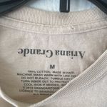 Ariana Grande  tan beige tee graphic tee t-shirt top short sleeve Photo 2