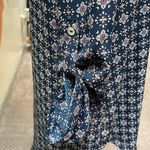 About A Girl mini dress. Size small. Silky soft. Abalone buttons. Photo 7