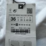 ZARA  Slim Flare Distressed Knee Jeans in White Photo 5