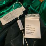 Boutique NWOT Metallic shiny short sleeve top size M Photo 8