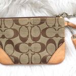Coach 🔃 Signature Logo Tan Wristlet Photo 1