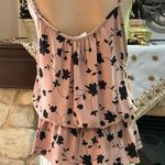 Sienna Sky Pink and black floral tank top with tie straps and ruffle detail Photo 4