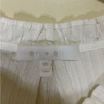 Chic White Ruffled Button Photo 4