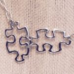 Puzzle Pieces Together Necklace Photo 2
