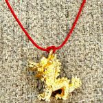 Small Gold plated Dragon Pendant Necklace with Red Cord Photo 0