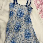 ASOS Blue and white floral mini dress with scalloped trim and blue straps Photo 2
