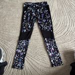 Avia  woman’s Black and Purple Dotted Leggings Photo 1