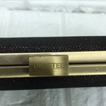 Unlisted  bronze glitter & gold clutch oval purse 8.5”‎ x 3.5” Photo 1