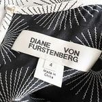 Diane Von Furstenberg  Sunburst Print Tiered Silk T-Shirt Mini Dress Black White  Photo 1