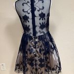 B. Smart Sleeveless Dress Photo 2