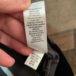 Athleta Ace Black Tennis Skort with silver reflective stripe on waistband Photo 9