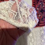 Free People  Cream Lace Top with burnt orange Embroidery size small Photo 2