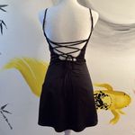 Tiger Mist cocktail dress. Black. Adjustable straps. Built in no slip bra. XS. Photo 2