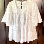Like New Merlette Brandt Eyelet Tiered
Swing Blouse White Medium Retail $500.00 Photo 0