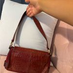 vintage wilson’s leather red y2k shoulder bag with buckle detail Photo 2