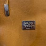 DKNY Women's Brown Leather Tote Bag with Pouch and Signature Plaque Photo 13