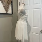 Lulus  Romantic Tale White Lace Skater Dress Size Small With Open Key Hole Back Photo 1