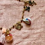 Charming Gold Charm anklet with Pink Accents Photo 2