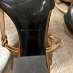 Balenciaga women’s gently used black and gold strappy sandals Photo 8