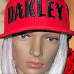 Oakley  red air ventilation and adjustable snap back closure Nwot Photo 1