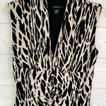 Arden B . Black/tan animal print below the knee dress Size medium Photo 1