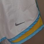 Nike NWOT  Women's White and Yellow Athletic Shorts Photo 2