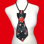 “Dainty Dapper”Festive Black Christmas Tie with sporty Santa Design Photo 0