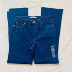 Nine West mid rise dark wash kick flare jeans with frayed bottom pant legs Photo 0