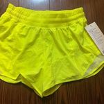 Lululemon Women’s fluorescent yellow  hotty hot low rise athletic shorts Photo 0