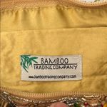 Sand Blossom Wristlet Bag Retailed for 98.00 Gold Photo 1