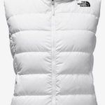 The North Face White puffer vest! Photo 0