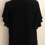 Ann Taylor - Black ruffled shoulders‎ short sleeve blouse 
Size M Photo 0