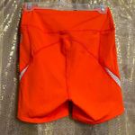 Free People Movement Space Race Orange Bike Shorts Medium NWOT Photo 1