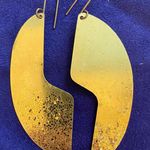 Large Gold Tone Abstract Puzzle Piece Photo 0