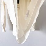 Veiled Ruffle Cinched Long Sleeve Blouse in Off White Photo 4