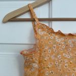 Love, Fire NWT  cropped cardigan and tank set in orange sherbet with ditsy print. Photo 2