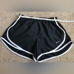 Nike  Shorts Women’s Size Medium Black with White Stripe Athletic Running. Photo 4