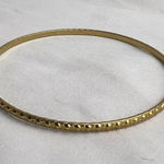 Vintage gold toned circular patterned thin bracelet Photo 0