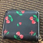 Juicy Couture black cherry print  wallet Photo 1