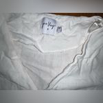 Chic White Asymmetrical Button Dress Size 0 Photo 1