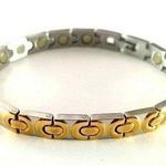 New/never worn stainless steel magnetic bracelet. 7.5 inches Gold Photo 0