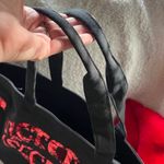Victoria's Secret  Black Tote Traveler with Red Sequins shaped like lips Photo 10