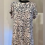 Boutique Lite Pink, Leopard Print,Short Sleeve dress
PTP 17”
Length 28” White Size M Photo 0