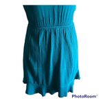 Altar'd State beautiful green faux wrap dress, flutter sleeves, fully lined, excellent condition. Size xs Measurements: Bust: armpit to armpit 15 inches Waist: side to side 11-15 inches Length: shoulder seam to bottom 29 1:2 inches Photo 6