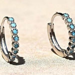 Sterling Silver Mini Hoop Huggies with Blue Stones Photo 0