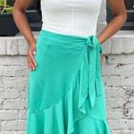 Free People Luluroe teal wrap skirt 
Fits size xs to s Photo 1