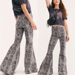 Free People • snakeprint flare jeans sz 26 Photo 2